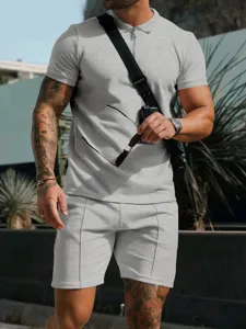 Men short sleeve waffle polo shirt and shorts casual summer set in light grey color.