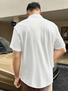 Men's casual short sleeve textured shirt, classic lapel design, comfortable daily wear.