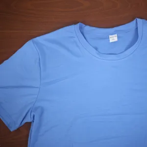Closeup view of light blue plain short sleeve t-shirt collar detail showing size XXL label.