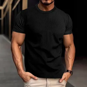 Men's black waffle knit short sleeve t-shirt, casual slim fit summer top for daily wear.