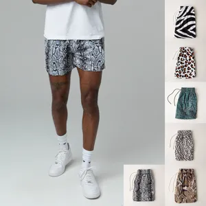 Mens casual athletic sports shorts with digital animal print for fitness and running.