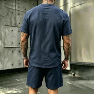 Detail view of men's casual linen short sleeve and shorts set in dark blue, perfect for beach.