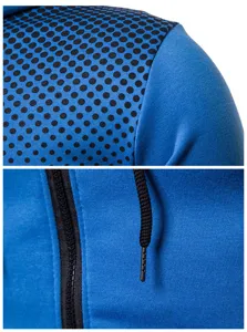 Blue zip hoodie detail showing soft fabric, black dotted pattern, and adjustable drawstring.