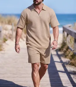 Detailed view of the men's waffle knit short sleeve polo and shorts set in solid khaki.