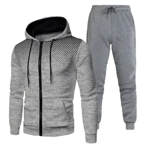 Men's grey zip-up hoodie and sweatpants set with black dotted gradient print detail.