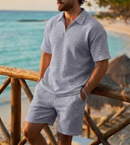 Men's casual waffle knit two-piece suit with lapel short sleeve polo and shorts for summer.
