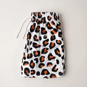 Men's mesh athletic shorts with bold black and orange leopard print, drawstring waist.