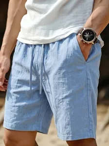 Men casual linen shorts detail view showing soft fabric texture and elastic waistband.