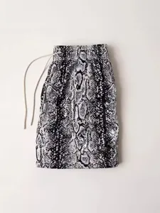 Men's fashion sports casual shorts featuring trendy snakeskin digital print and elastic waist.