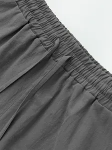 Close-up detail view of mens casual cotton linen shorts elastic waistband with drawstring.