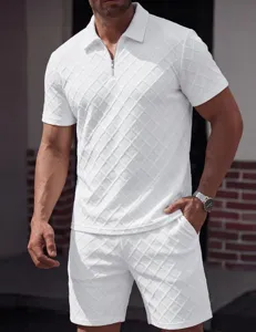 Close-up detail of men summer white jacquard polo shirt and shorts casual knitwear set.