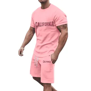 Closeup view of men's casual t-shirt and shorts set with California text print details.