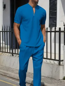 Men waffle zip polo shirt and trousers casual tracksuit set for daily outdoor wear.