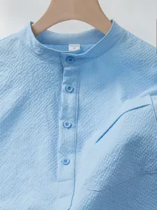 Light blue textured mandarin collar short sleeve casual shirt for men daily wear.