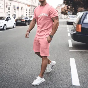 Men's casual pink short sleeve t-shirt and shorts sportswear set detail view and design.