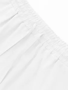 Men's casual linen shorts elastic waistband adjustable drawstring texture close up view
