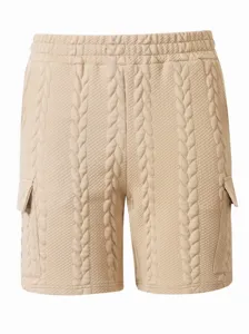 Detailed view of beige men's cable knit casual shorts with side cargo pockets and drawstring.
