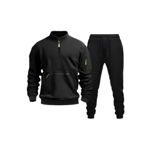 Men's black half-zip fleece sweatshirt and sweatpants tracksuit set with vibrant green accents for casual wear.