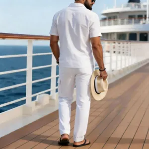 Detailed view of the stylish white cotton linen men's casual two-piece outfit on deck.