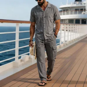 Detailed lifestyle shot of men's casual linen two piece set on cruise deck, showing outfit drape.