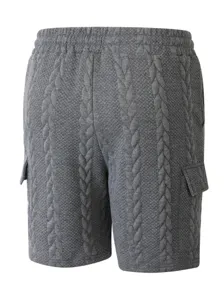 Men grey knit cargo shorts detailed view showing unique cable texture and side pockets.