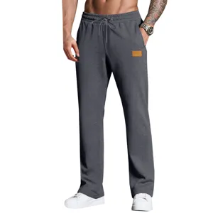 Men's casual loose grey sweatpants with drawstring waistband and leather patch for daily wear.