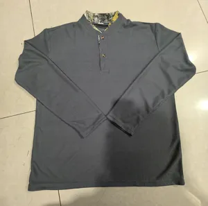Men's casual long sleeve waffle knit Henley shirt with camouflage trim collar for daily wear.