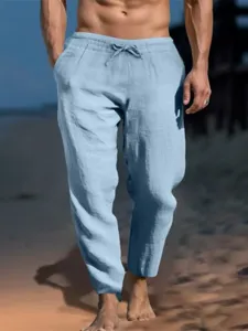 Lässige Herren Leinen Strandhose mit Kordelzug, bequeme blaue Freizeithose einfarbig.