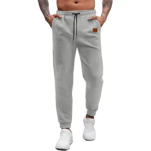 Men grey waffle sweatpants casual joggers detail view comfortable plaid fabric athletic pants fit