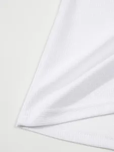 White waffle knit fabric detail shot, premium textured long sleeve t-shirt close up view