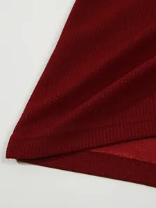 Burgundy waffle knit fabric hem detail, fine texture and neat stitching for men apparel.