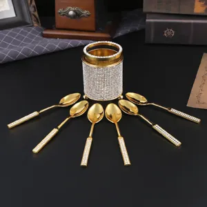 Barattolo porta posate dorato con strass e cucchiai abbinati, decorazione per tavola.