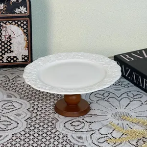 European style embossed white ceramic fruit plate with wooden base for home decor