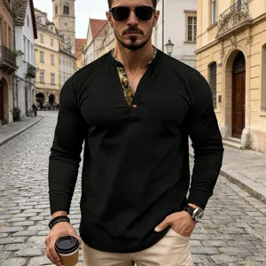 Mens waffle knit long sleeve henley t-shirt with contrast color inner placket detail.