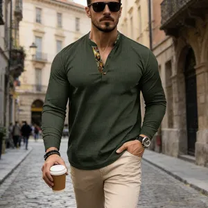 Detail view of the men's green waffle knit long sleeve henley shirt with contrast collar.