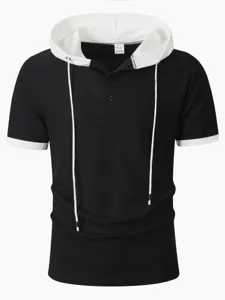 Detail view of men short sleeve waffle knit hooded polo shirt in black with white contrast.