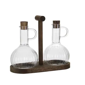 High borosilicate glass oil bottle set with wooden rack and stoppers, perfect for kitchen storage.
