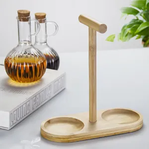 Wooden oil bottle holder and glass condiment jar set for kitchen seasoning storage.