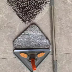 Large triangular flat mop with chenille replacement pad and stainless steel handle for floor cleaning.