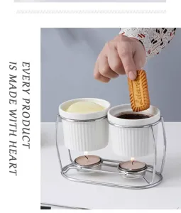 Ceramic double cup chocolate fondue set with metal stand and candle warmer for dessert.