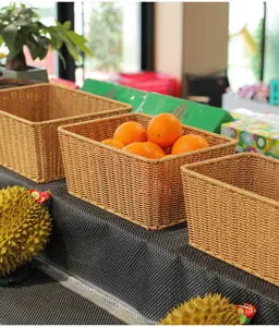 Gedetailleerd shot van geweven opbergmanden, ideaal voor fruit, snacks en kleine spullen.
