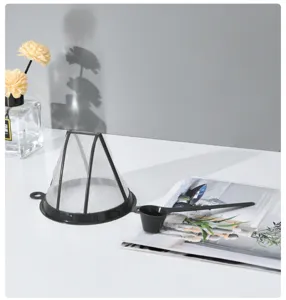 Plastic cone coffee filter with handle, reusable drip pour over brewer for home office.