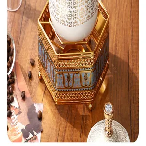Ensemble chauffe-thé café métal céramique style oriental aux motifs bleus et dorés élégants.