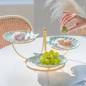 Plato de postre concha de perla europea soporte de fruta de varios niveles para té de tarde.
