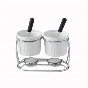 Double ceramic fondue pot set with metal stand and tealight candles for melting chocolate.