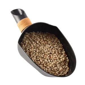 Paletta per chicchi di caffe in acciaio inox con manico in pelle per torrefattori.