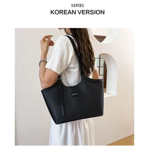 Stylish black PU leather tote bag for women, large capacity shoulder bag for daily work commute.