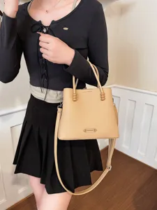 Chic apricot bucket bag for women, stylish faux leather crossbody handbag with cute bead handles.