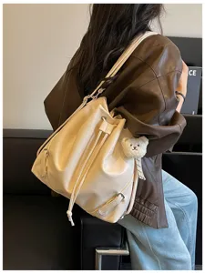 Mochila saco de piel PU para mujer bolso de hombro casual diario con colgante de oso