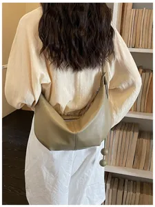 Minimalist slouchy hobo shoulder bag, premium leather crescent dumpling bag for women.